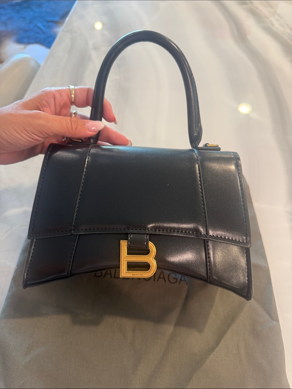 Balenciaga Black Leather Top Handle Bag with Gold 'B' Accent
